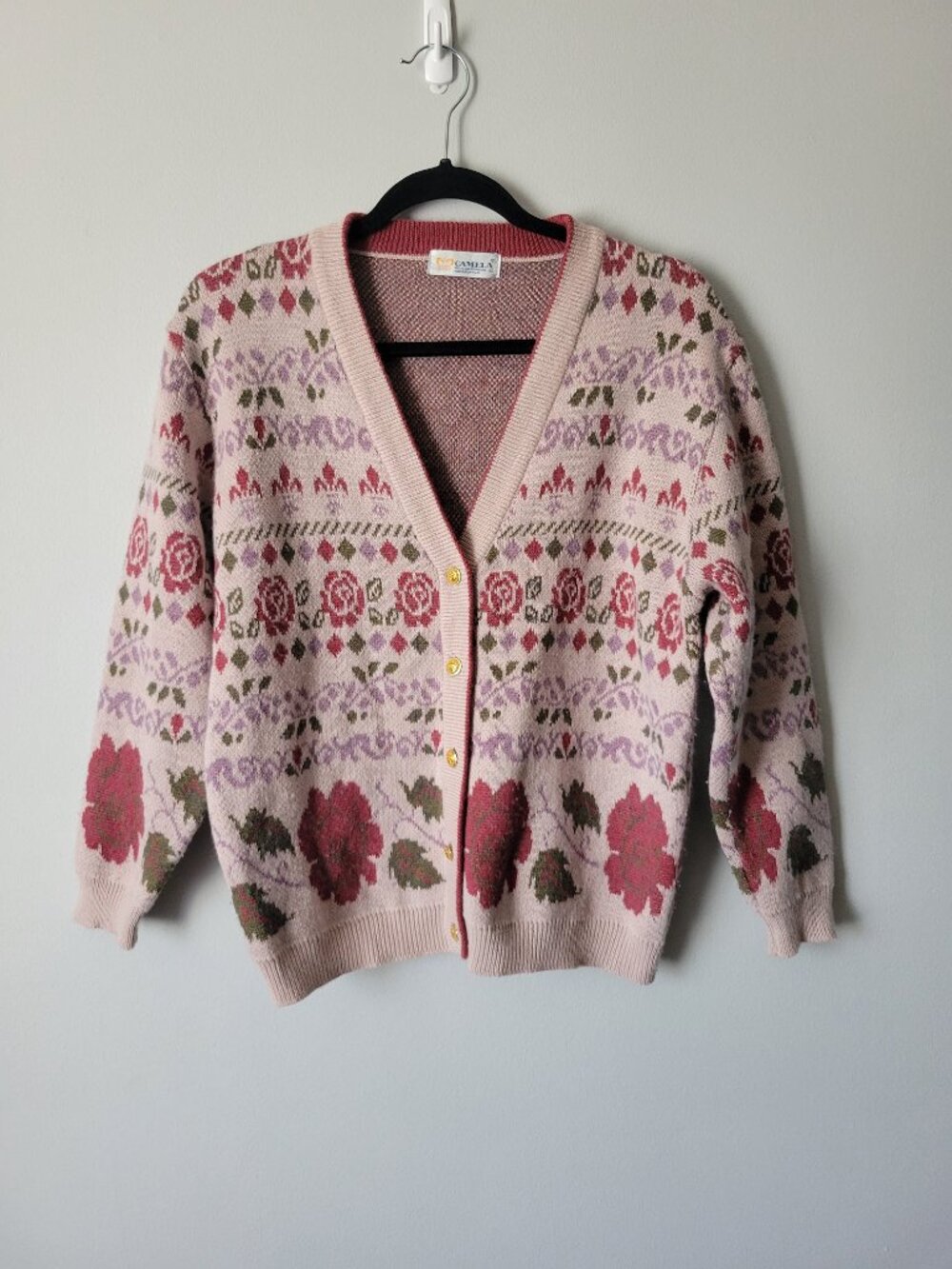 Vintage pink knitted cardigan with floral patterns